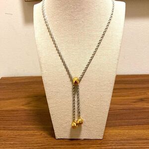Slide Necklace Rhodium Plated with Gold tone Faceted Beads.